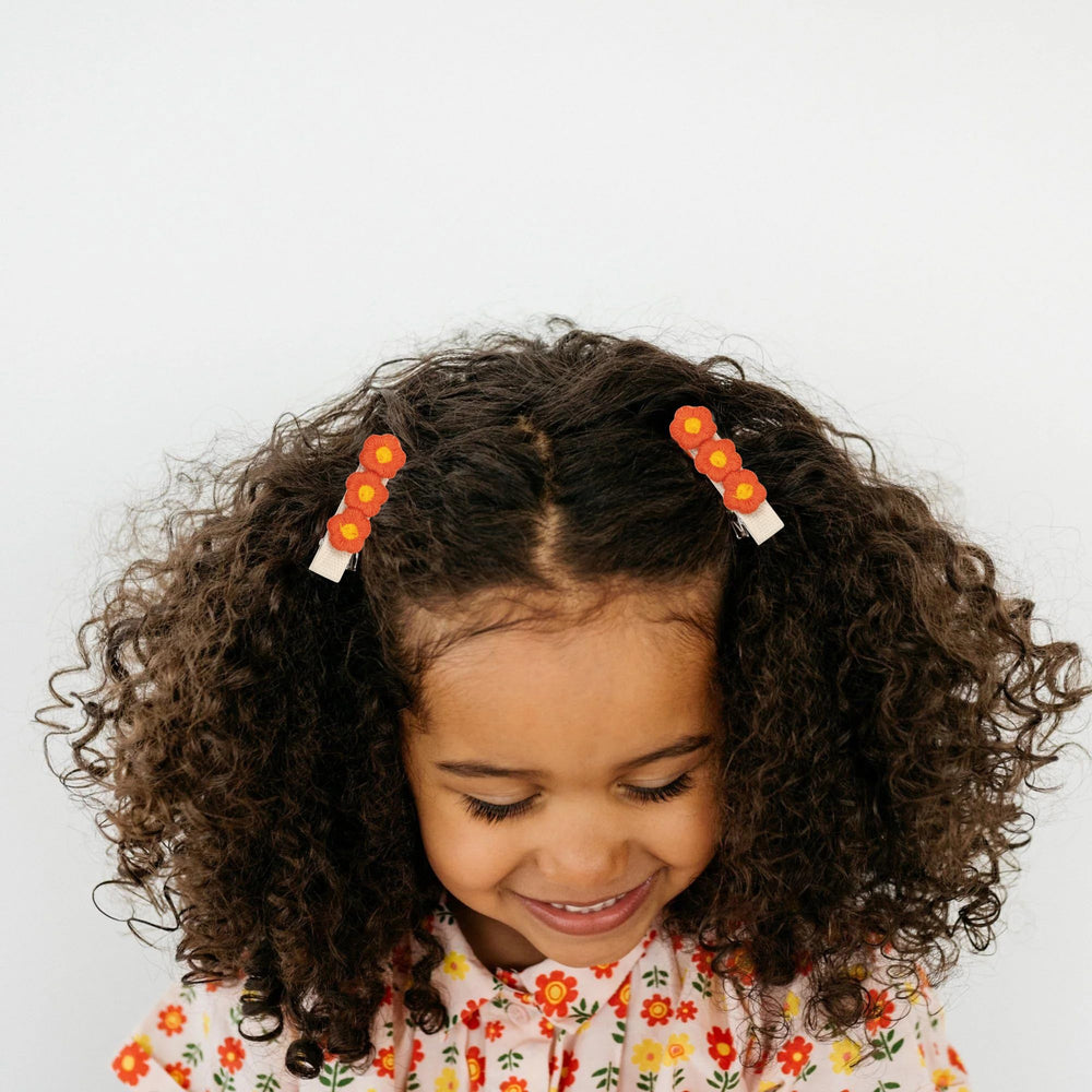 CellElection daisy flower barrette lightweight for comfortable all-day wear