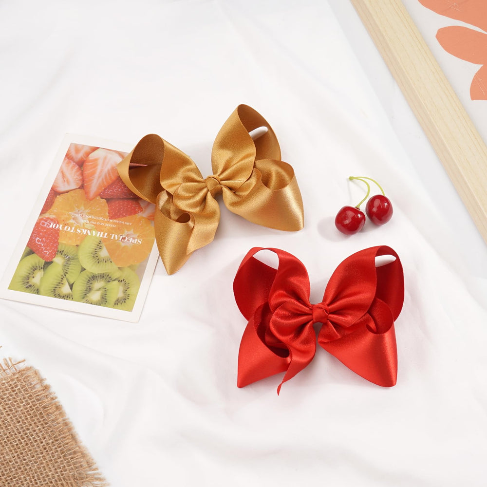 CellElection bows with metal alligator clips gripping hair securely during activity.