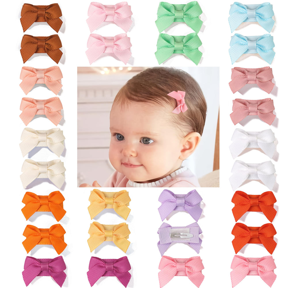 CellElection mini bow clip closeup highlights tiny size perfect for fine baby hair.