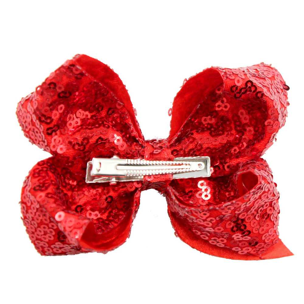 CÉLLOT alligator clip bows demonstrate secure grip on hair of all types