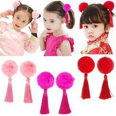 CÉLLOT baby-bows furry balls for festive styling and gentle wear