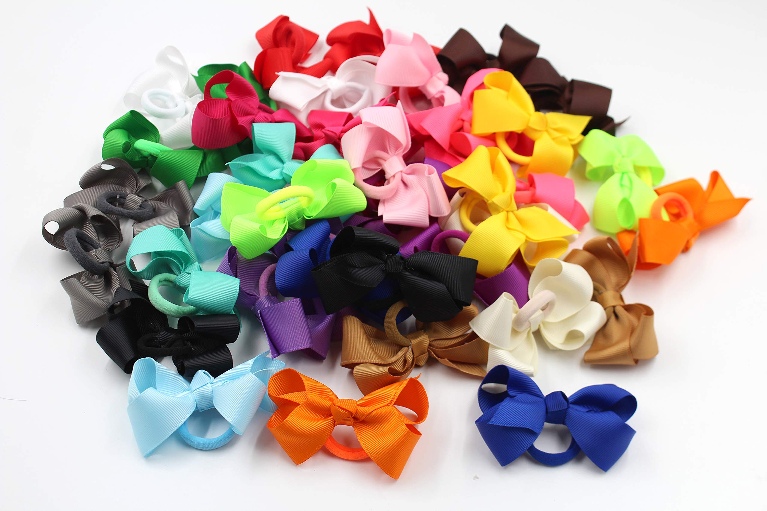 CÉLLOT boutique 3-inch orange hair bow with elastic tie adds sunny charm for school.