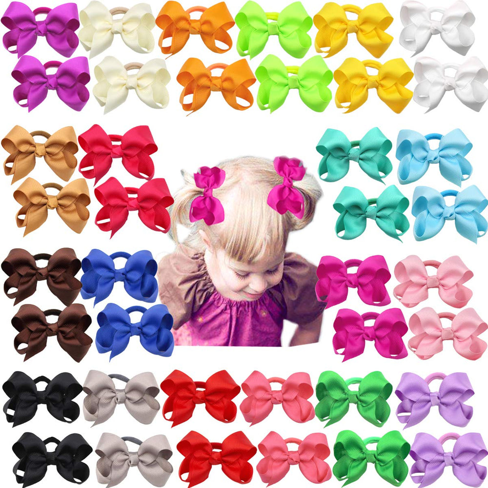 CÉLLOT boutique 3-inch red hair bow with elastic tie ideal for toddler ponytails and playtime.
