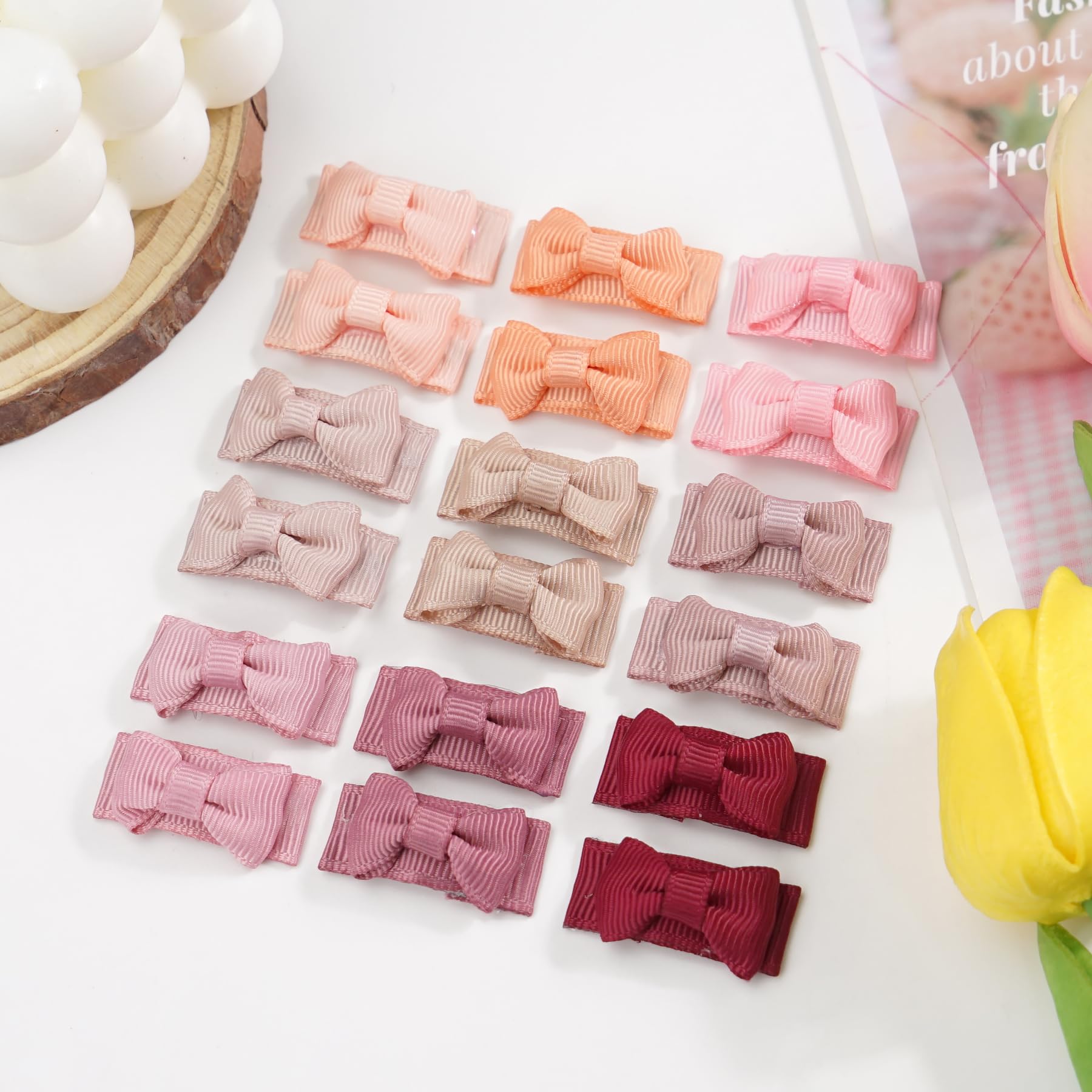CÉLLOT bows-on-baby-hair shown in a gentle clip to keep wisps in place