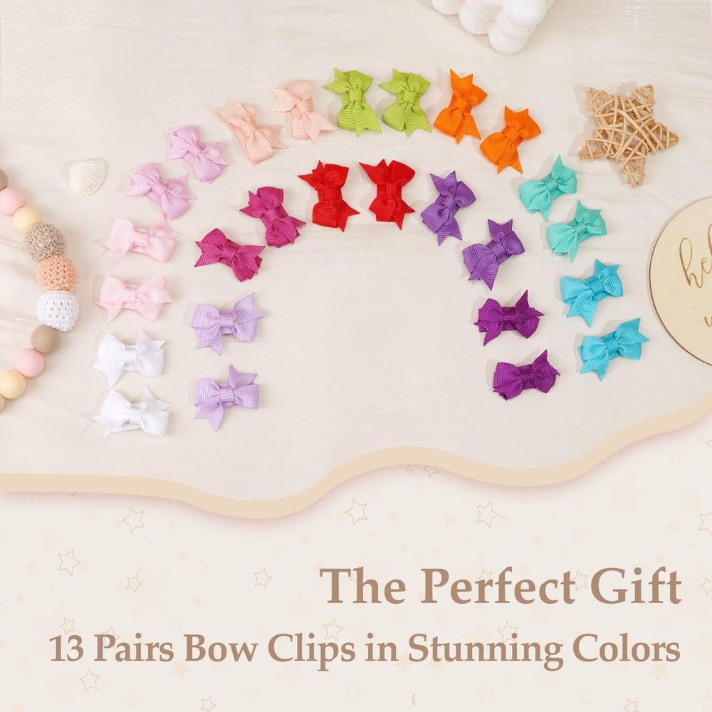 CÉLLOT dovetail-style tiny bows offer delicate attachment for soft toddler hair.