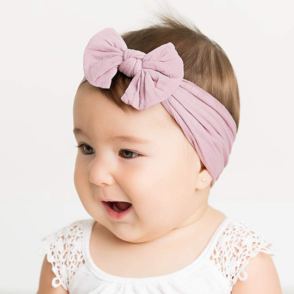 CÉLLOT easy-to-wear snug-fit design shown on a baby during playtime.
