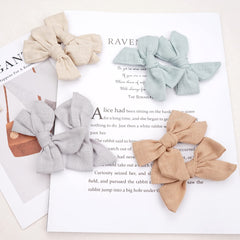CÉLLOT girls alligator clip detail demonstrates secure, removable attachment.