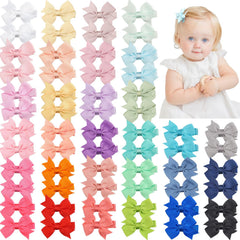 Celllot hair clips 2-inch baby bows showing gentle grip for delicate infant hair