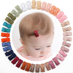 CÉLLOT mini-ribbon-clip close-up showing delicate 1.2-inch bow for fine hair