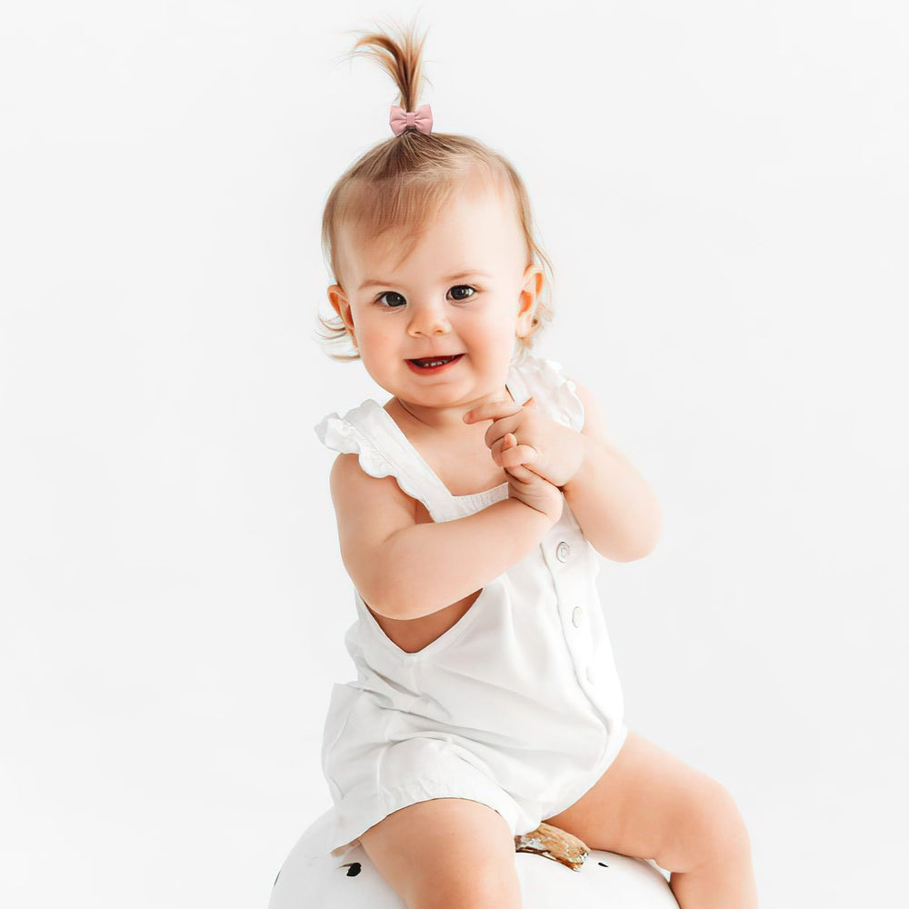 CÉLLOT coordinating outfits with tiny bows for photos and daily wear.