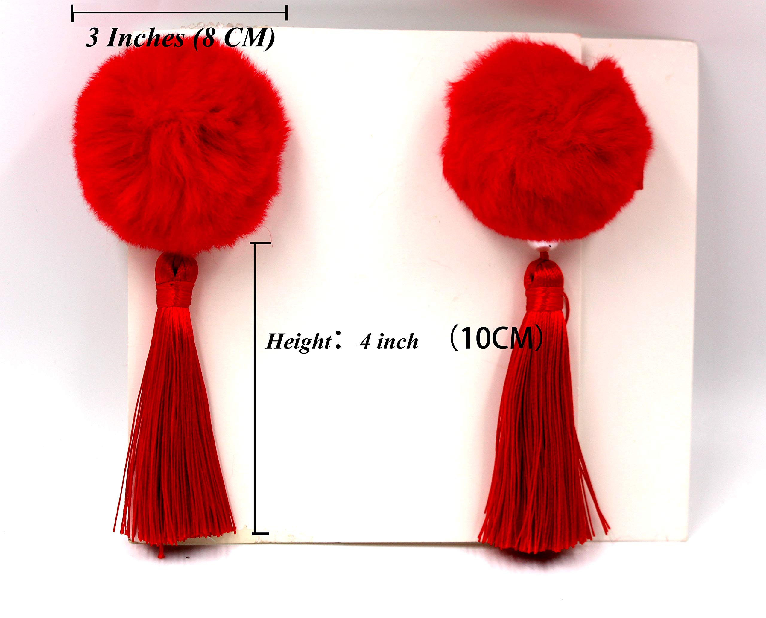 CÉLLOT pom-pom bow tassels highlight playful look and easy dress-up use