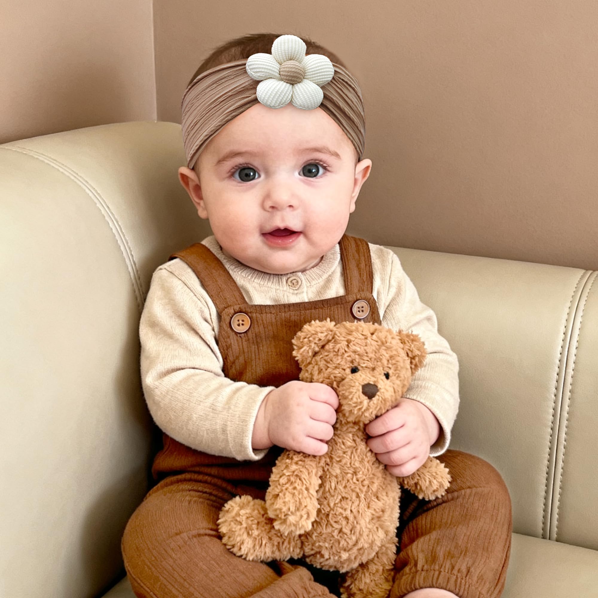 Cellot headbands worn by baby girl for adorable portrait session.
