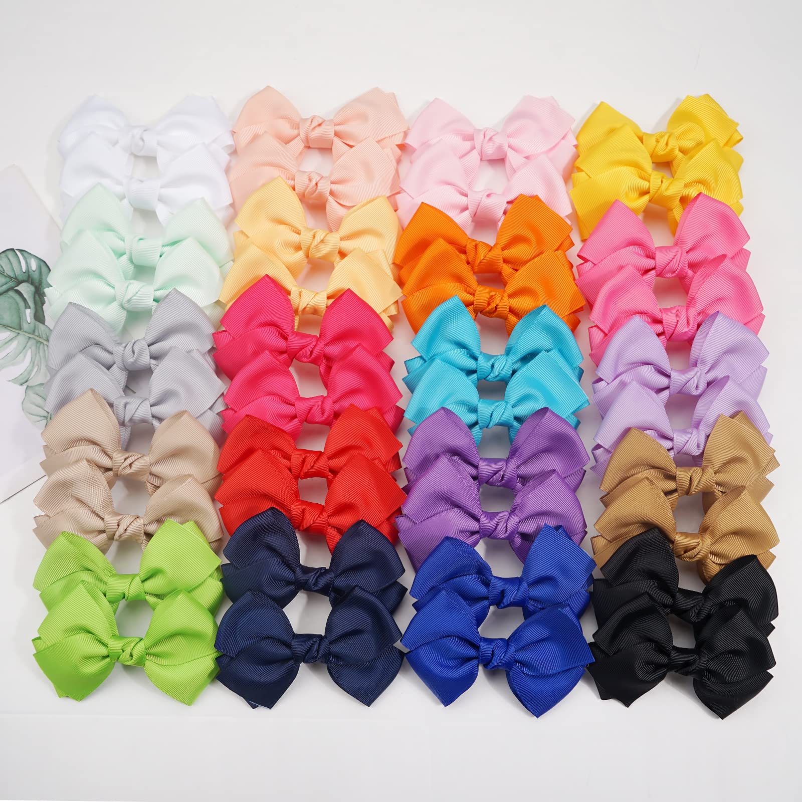 Cellot hair bows display on a doll showing coordinated accessory ideas.