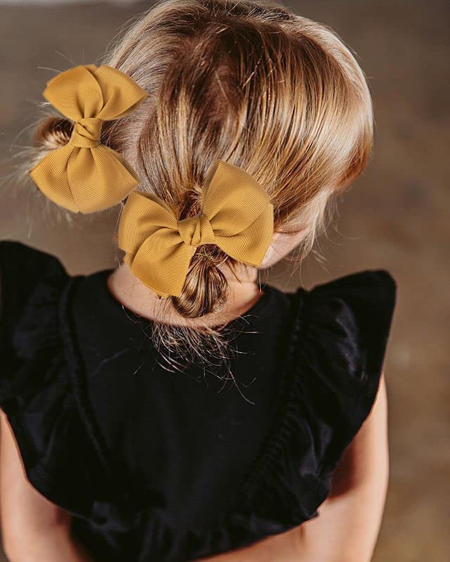 Cellot kid-fashion bow set styled with popular outfits and playful mood.