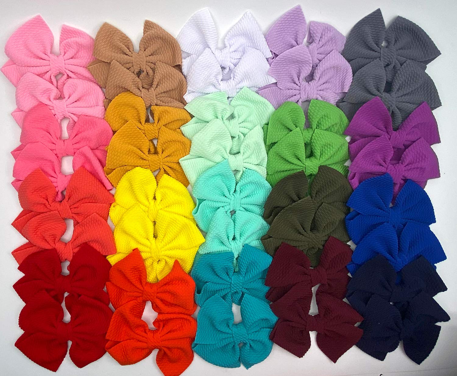 CÉLLOT bows are easy to clip and reuse across outfits