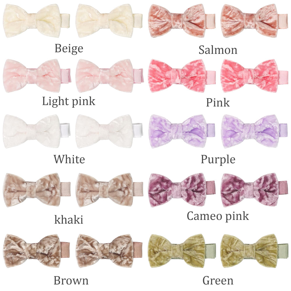 CÉLLOT two-inch bows clip securely on tiny hair.