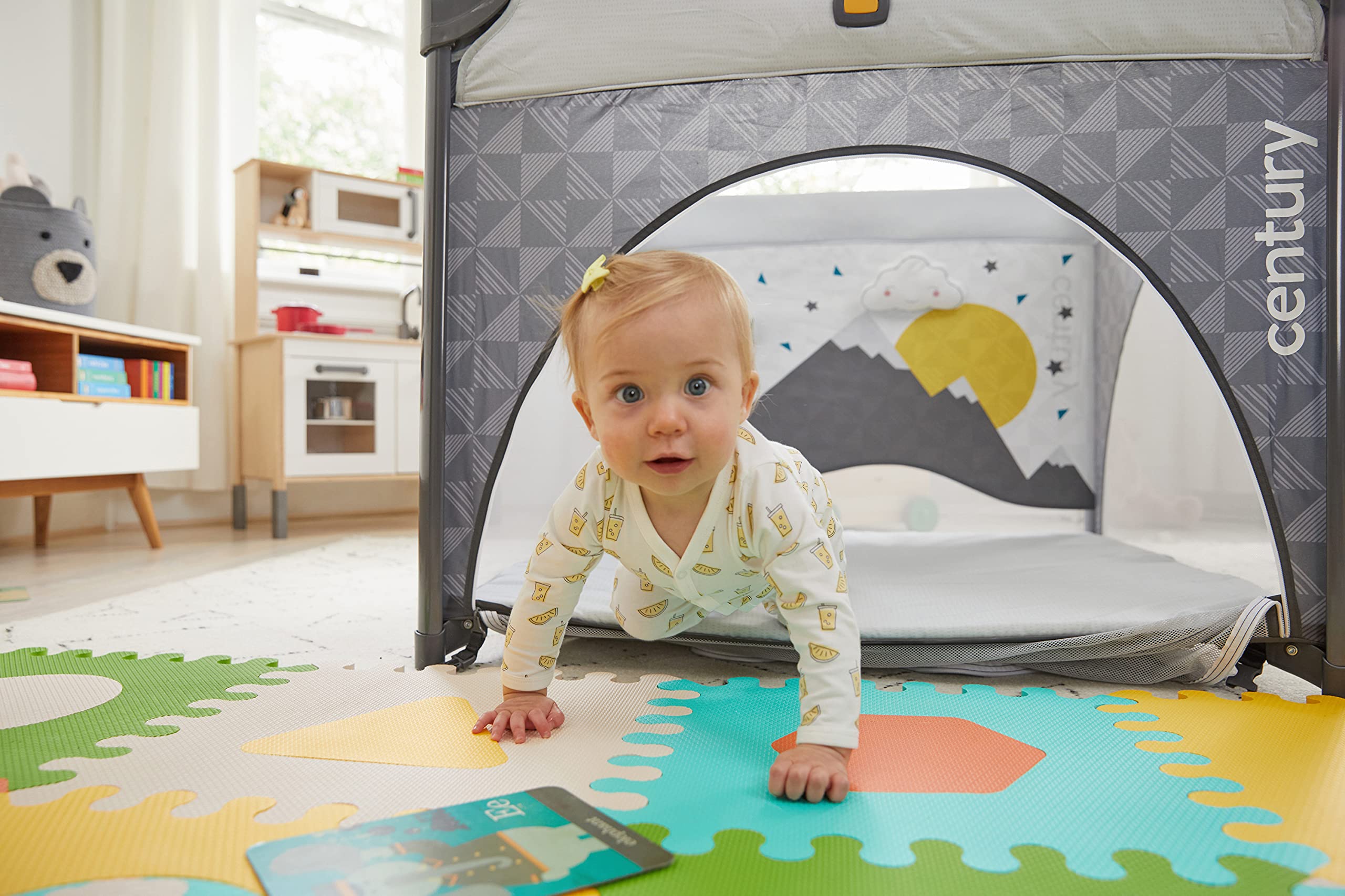 Century Play On fold-travel-bag image shows portable setup for on-the-go families.