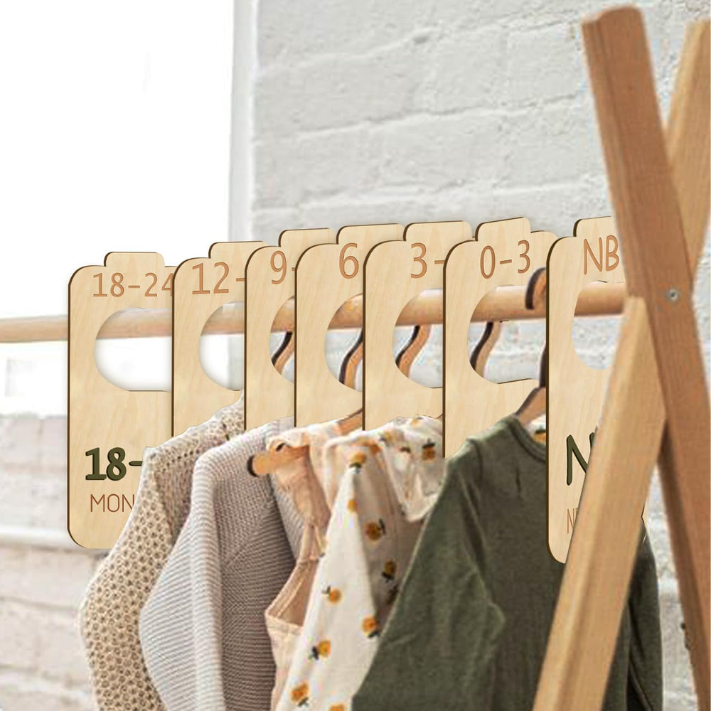 Cephira baby closet divider wood-closeup-edge presents sturdy construction for daily wardrobe changes.
