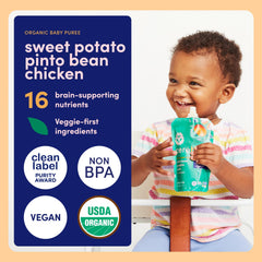 Baby eating from a Cerebelly pouch, a convenient toddler meal option.