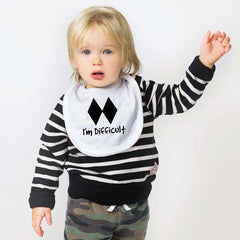 ChalkTalkSPORTS skiing bib worn by a baby demonstrates a roomy fit for meals.