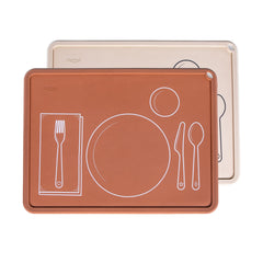 Chamos Montessori placemat for toddlers in clay color with outlines for independent eating.