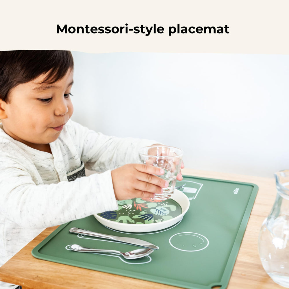 Chamos placemat with raised edge catching spills for easy cleanup.