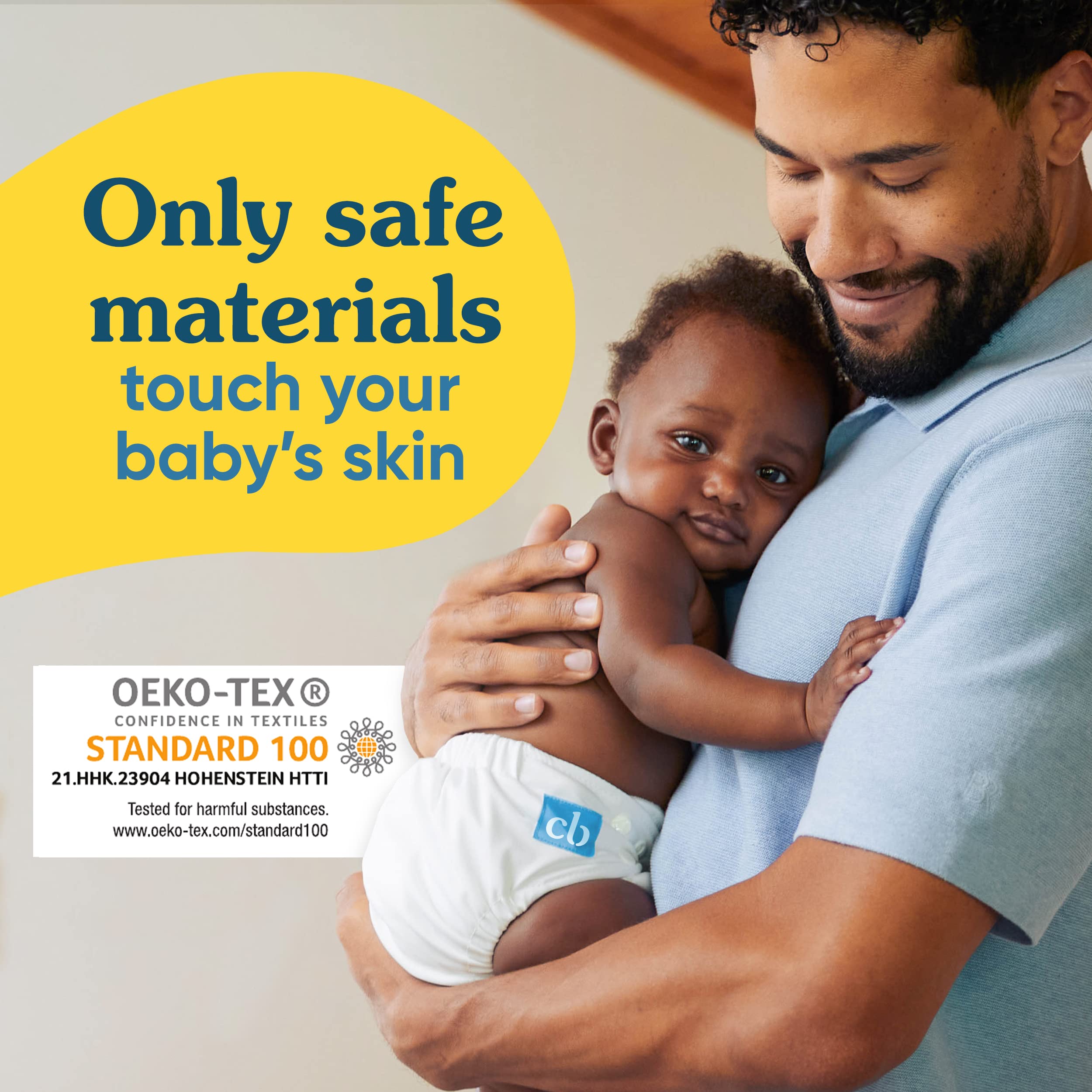Charlie Banana diaper features adjustable back elastic and snaps for secure fit.