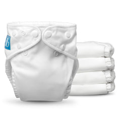 Charlie Banana cloth diaper all-white pack shows soft, skin-friendly fabric and compact profile.