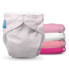 Charlie Banana pastel pink diaper closeup showing edge-to-edge softness for baby's skin.