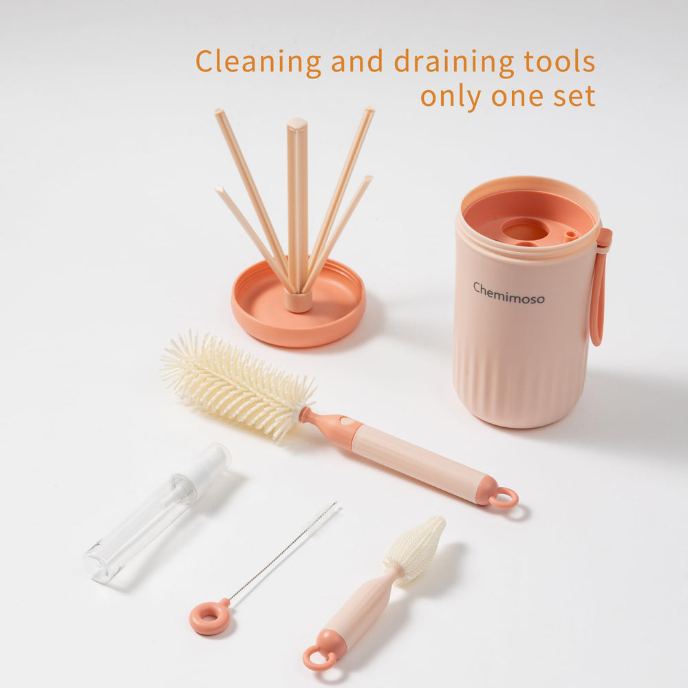 Chemimoso pacifier brush in pink, keeps small items clean during outings.