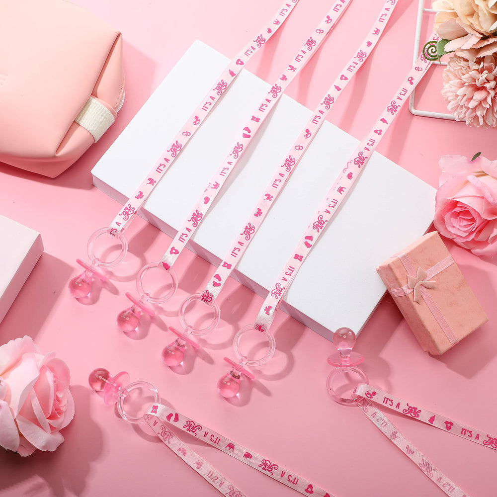 CHENGU pink acrylic pacifier necklace ribbon-length detail emphasizes long hanging use