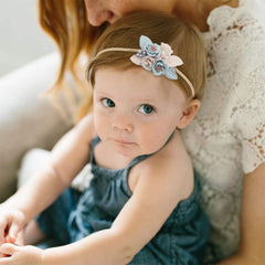 Cherrboll elastic headbands adapt as babies grow for longer wear.