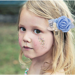Cherrboll flower hair clip closeup shows handcrafted petal texture