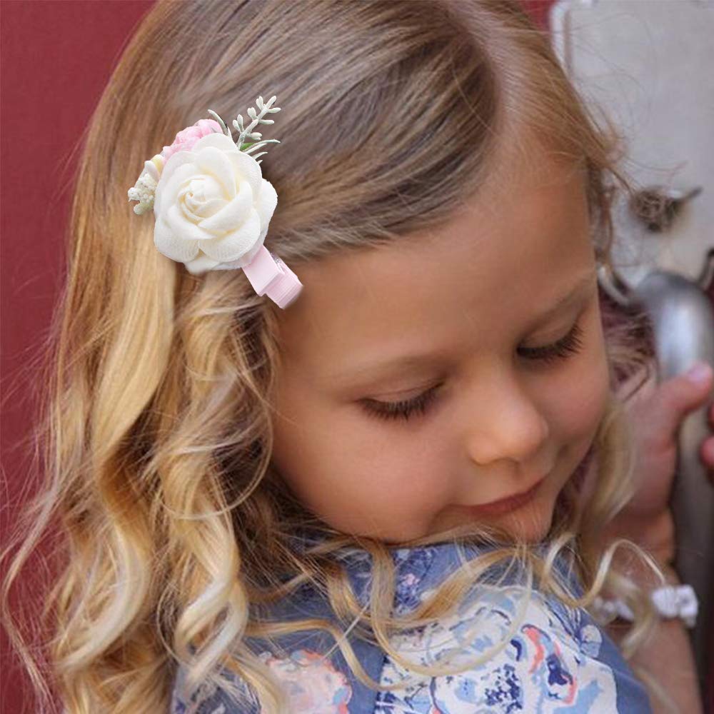 Cherrboll cream flower clip close-up with pearl detail for delicate styling.