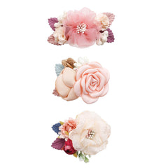 Cherrboll flower hair clip petals closeup shows handcrafted fabric petals for delicate baby styling.
