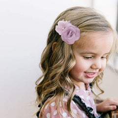 Cherrboll pink petal clip on baby outfit adds charming daily detail.