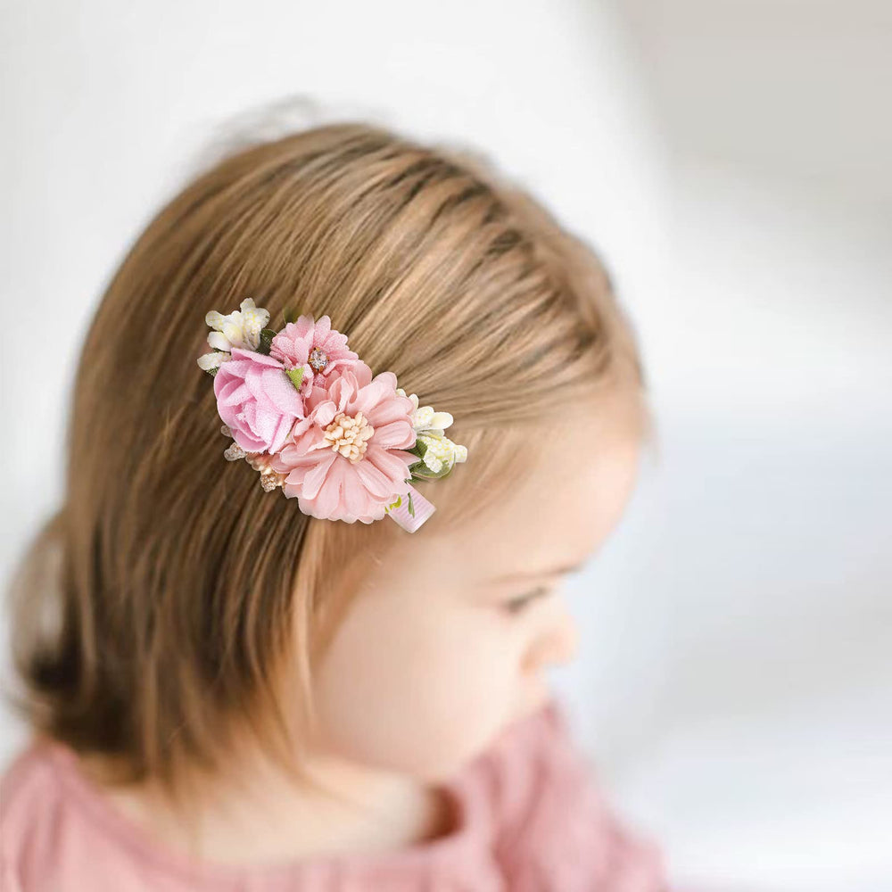 Cherrboll mint-pattern clip in a little girl's hair for everyday outfits.