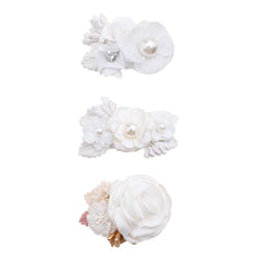 Cherrboll flower hair clip set with handmade petals for gentle newborn styling.