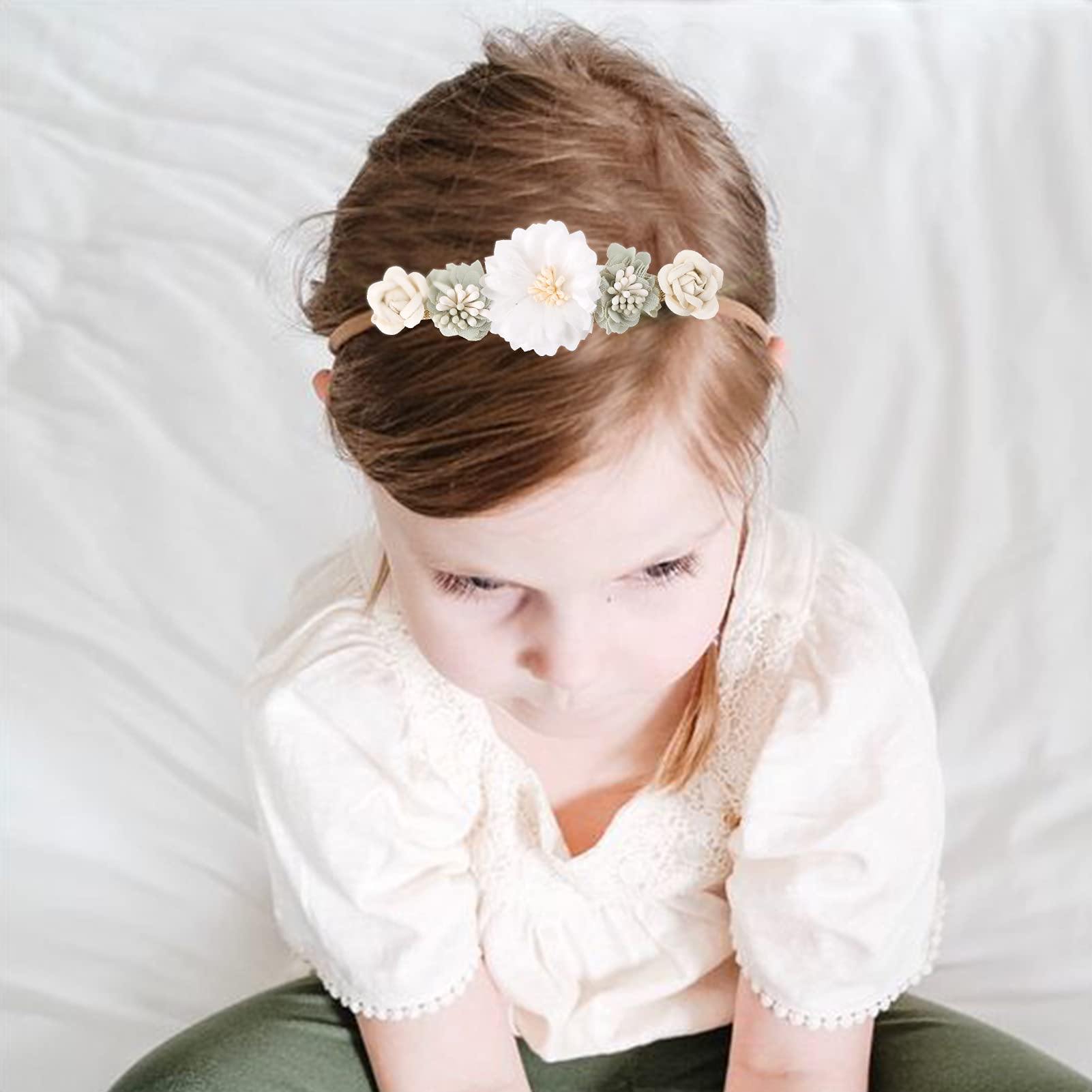 cherrboll flower headbands arranged for birthday party and photo prop use