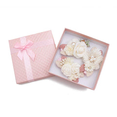 Cherrboll lavender daisy flower clip securing hair during play.