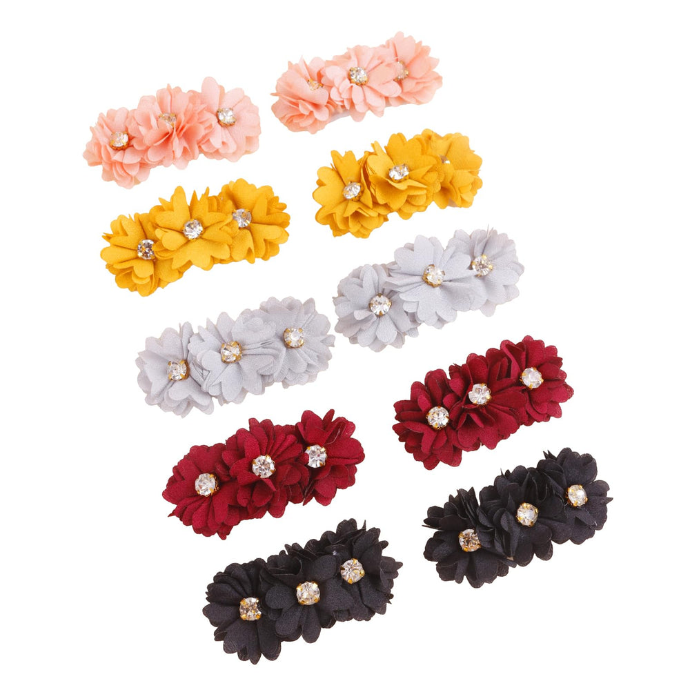 Cherrboll newborn photography clip provides soft floral touch.
