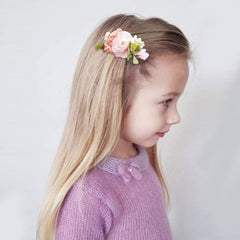 Cherrboll non-slip alligator clip detail emphasizes grosgrain-lined grip for fine hair.