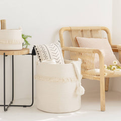 CherryNow tassel-detail basket highlights decorative tassels for nursery decor.