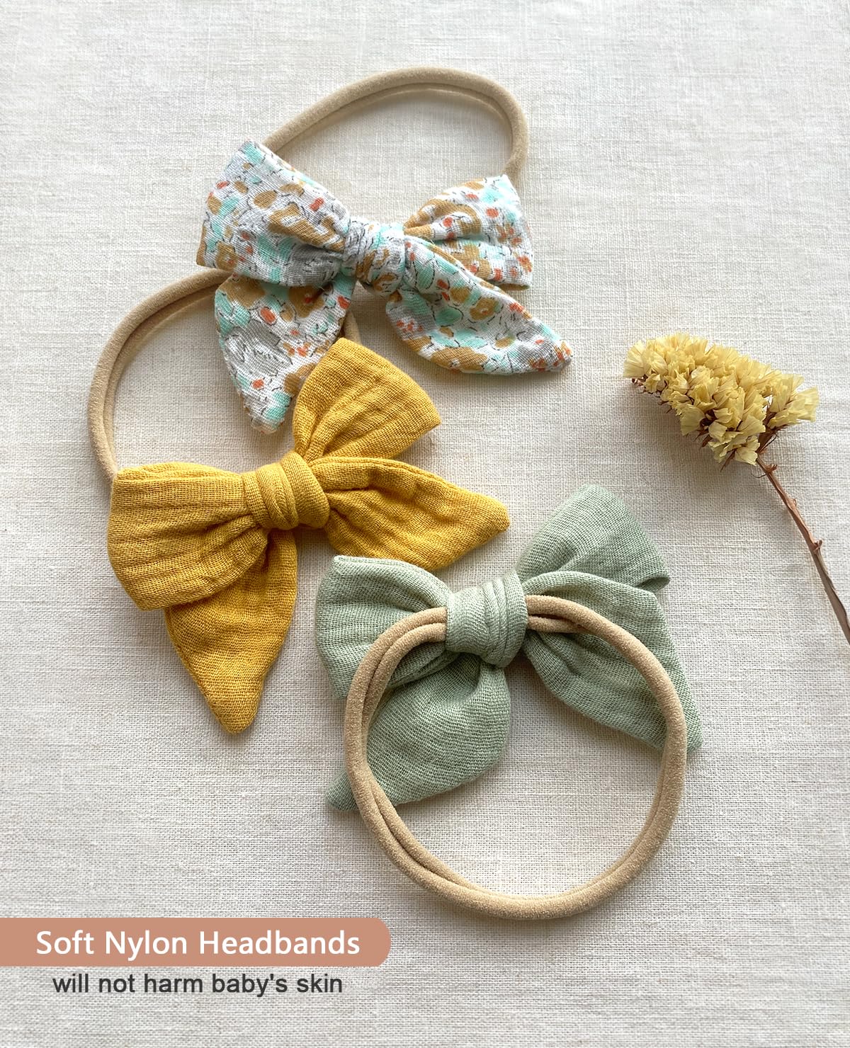 Cherssy baby bow worn on newborn for cute, secure styling