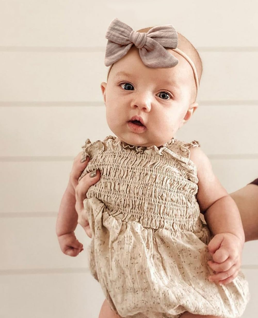 Cherssy baby hair accessory in photoshoot setup for dress-up moments