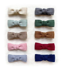 Cherssy baby hair bow clip in forest tones adds gentle color to fine hair.