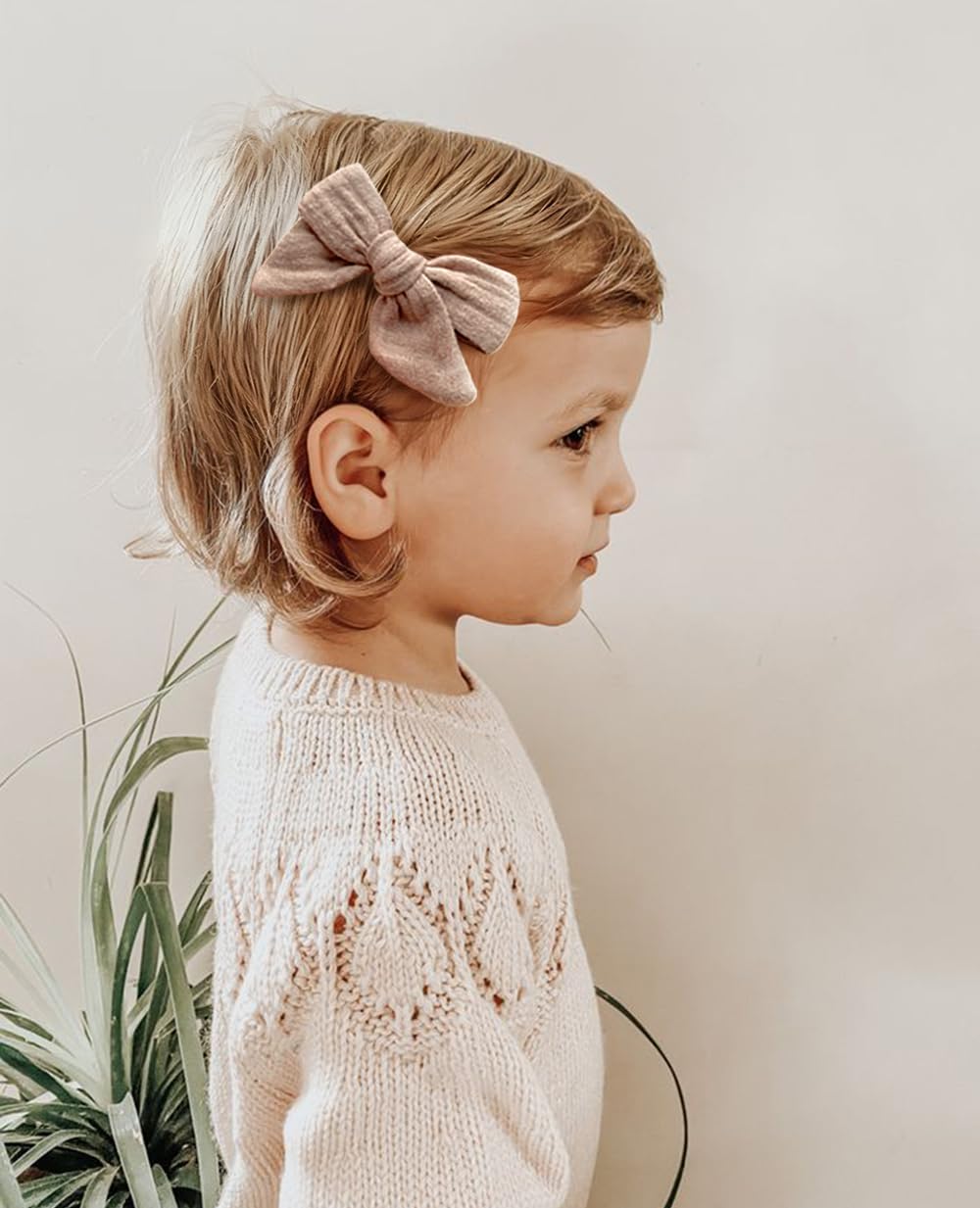 Cherssy Muslin Bow Clip worn from baby to school-age children across daily activities.