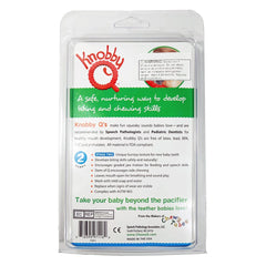 Chewy Tubes Knobby Q Red knobby texture closeup for safe chewing and play
