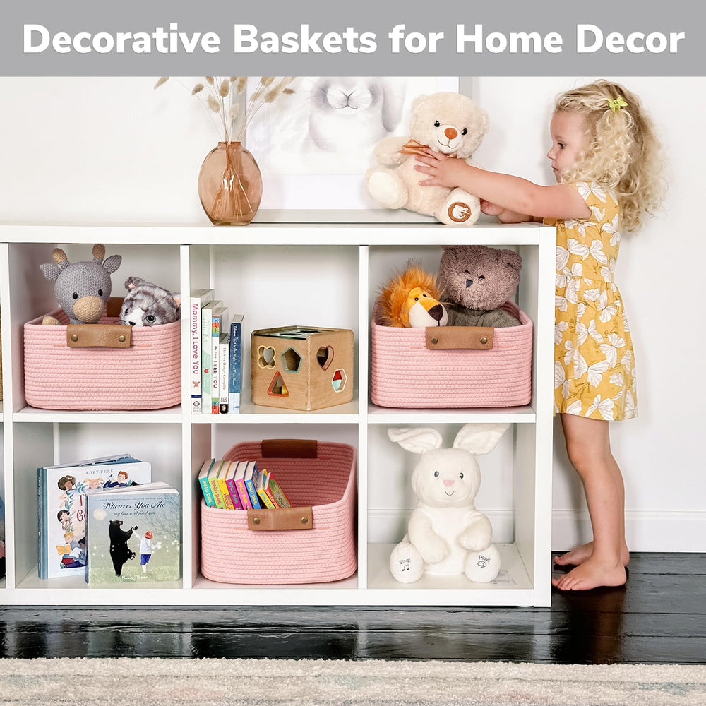 CHICVITA pink storage basket used as a toy organizer in a playroom.