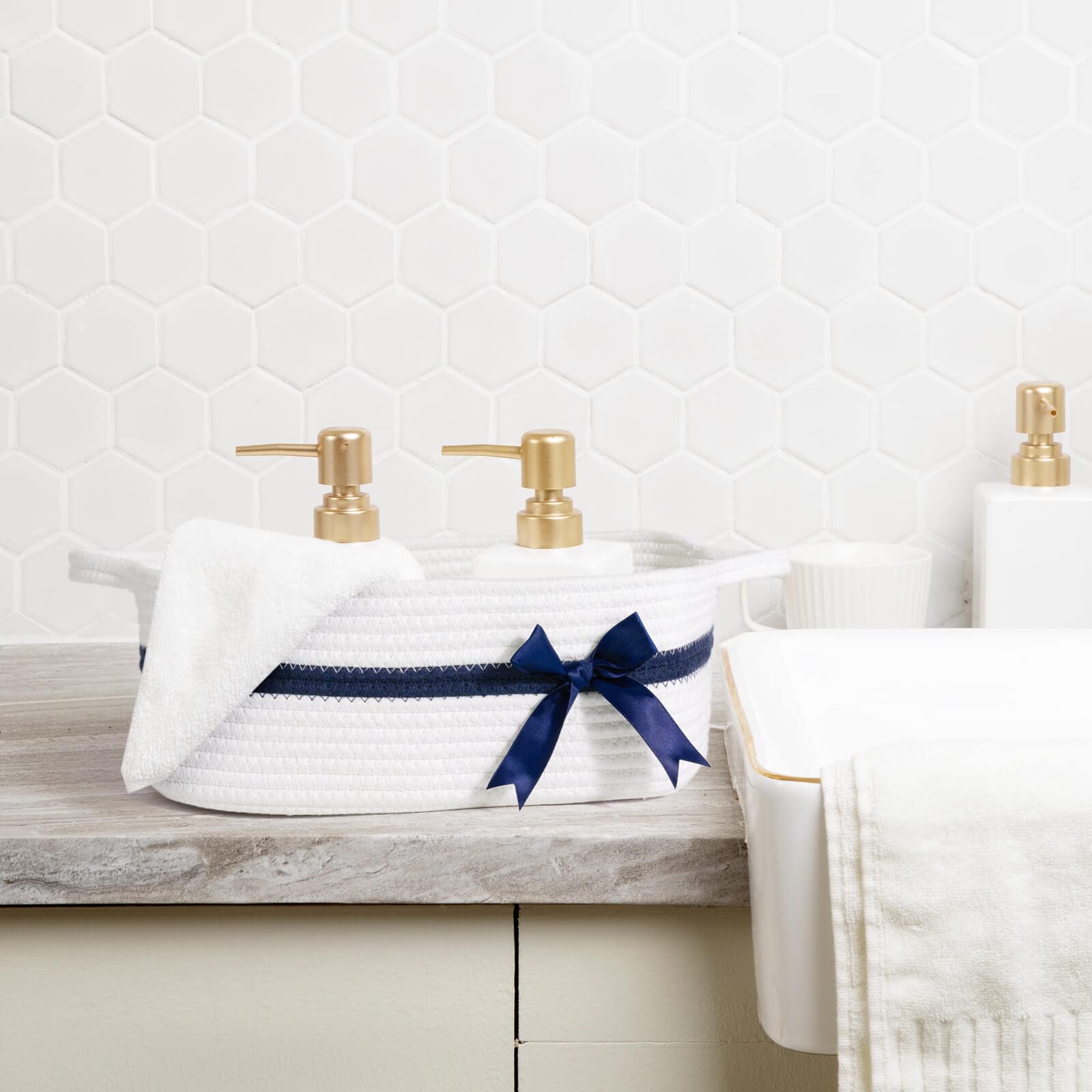 CHICVITA White Small Basket bathroom-organizer keeps toiletries tidy on countertops.